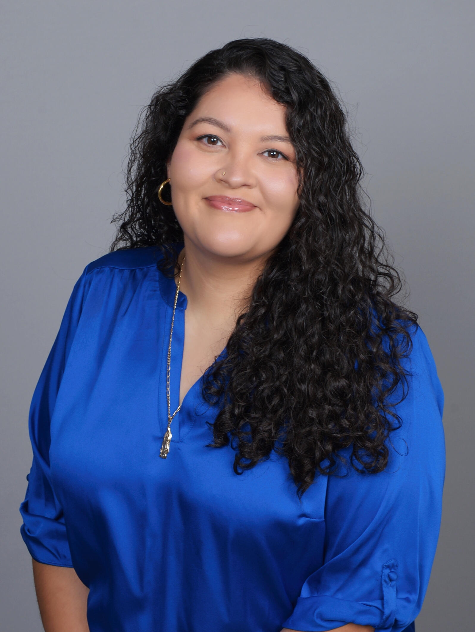 Professional headshot of Angy Hanon, LMHC, ATR, licensed mental health counselor and art therapist